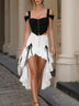 Black off-the-shoulder top paired with a white high-low skirt set