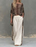 Leopard-print top and beige wide-leg trousers set