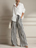 Casual white shirt and striped wide-leg pants set