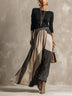Black top and color-block pleated maxi skirt set