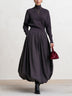 Long-sleeve A-line maxi dress with a high neck and lantern hem