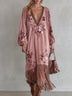 Vintage pink printed faux-suede maxi skirt with a fringed hem