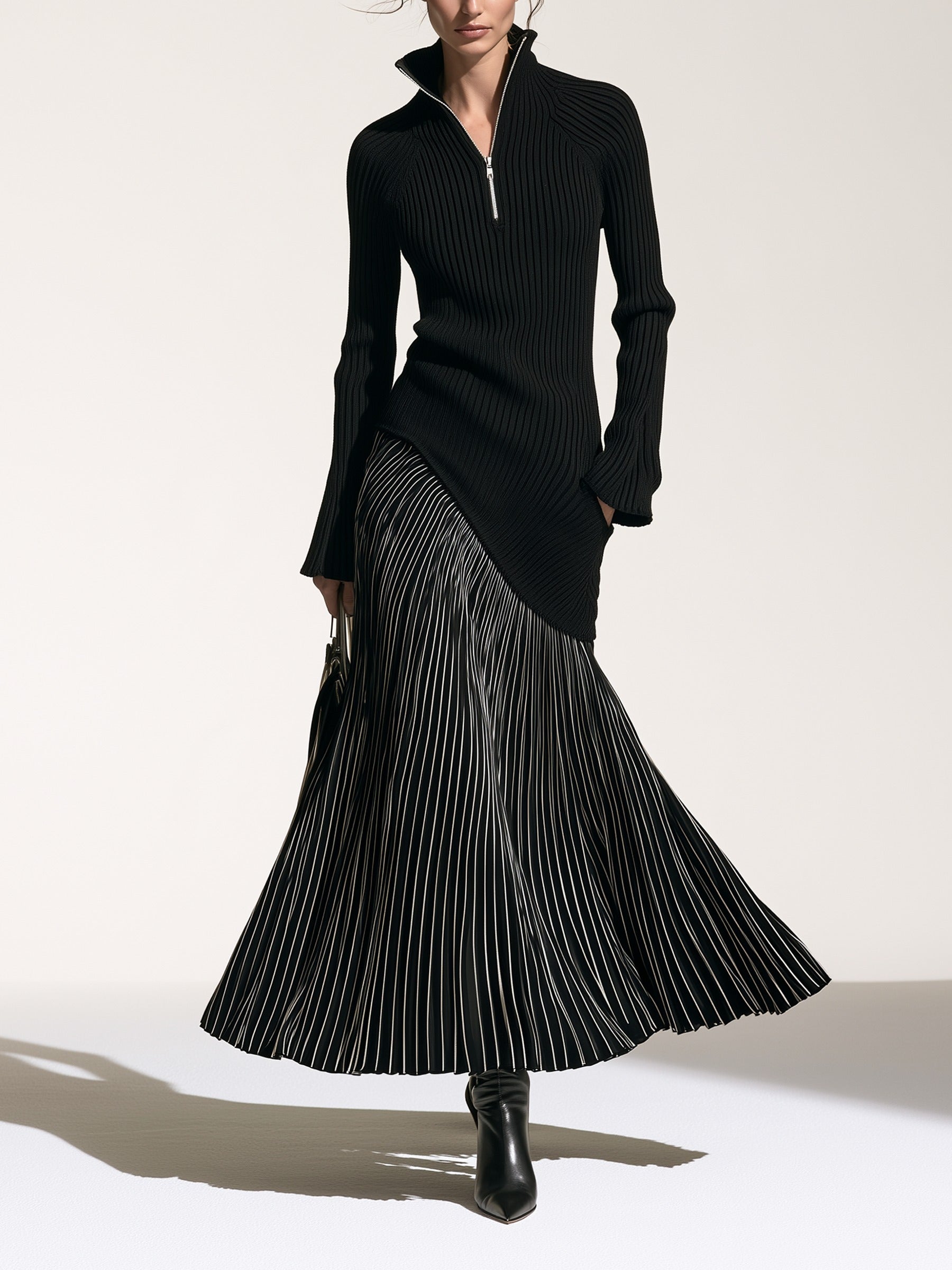 Black half-zip maxi dress with pinstriped hem panel