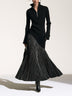 Black half-zip maxi dress with pinstriped hem panel