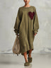 Relaxed-fit olive green sweatshirt dress with heart-shaped patch