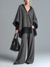 Grey hooded zip-up cape top with fringe and wide-leg trousers set