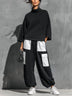 Black high-neck top and color-block patch-pocket cargo pants set