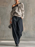 Elegant one-shoulder bow top and wide-leg trousers set