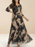 Elegant 3/4-sleeve printed waist-cinching dress