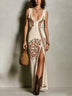 Bohemian-Style Printed Dress with Deep V-Neck and High Slit