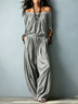 Loose two-piece set featuring an off-shoulder grey cotton top with three-quarter sleeves and matching trousers.