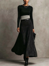 Modern Black Long Sleeve Top and High-Waisted Asymmetrical Maxi Skirt Set