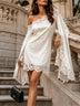 White satin mini dress with one-shoulder lace paneling