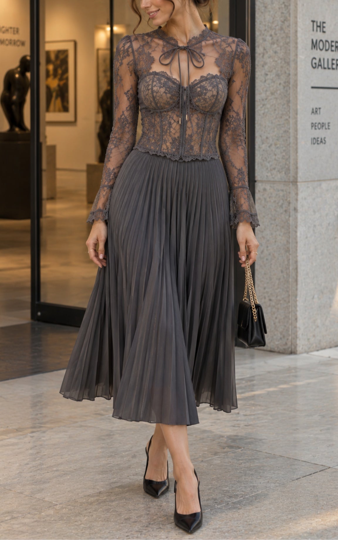 Elegant grey midi dress featuring lace panels and pleated chiffon