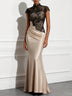 Champagne-colored satin mermaid gown with black lace