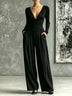 Elegant halter neck top and high-waisted trousers set