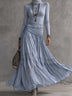 Blue high-neck lace-panel top and pleated maxi skirt set