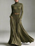 Elegant olive green high-neck fringed top and skirt set