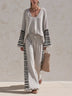 Casual grey two-piece set with striped paneling and a loose fit