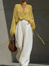 Yellow V-neck chiffon top and white trousers set
