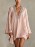 Light Pink V-neck Mini Dress With Rhinestone Trim And Fringed Hem