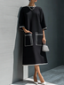 Elegant Black Contrast Trim Pocket Midi Dress with Relaxed Short Sleeves