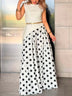 White irregular sleeveless top and polka-dot skirt set (waist chain not included)